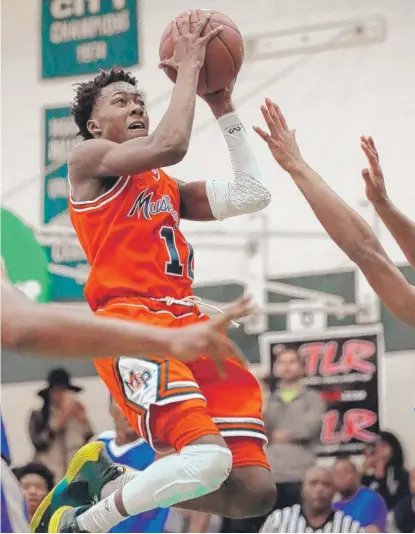  ??  ?? Senior Ayo Dosunmu will lead Morgan Park against Champaign Central in the Chicago Elite Classic. | KEVIN TANAKA/ FOR THE SUN- TIMES