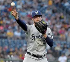  ?? Matt Freed/ Post- Gazette photos ?? Jordan Lyles returned to PNC Park Monday and beat his former teammates, 9- 7. Lyles went five innings for Milwaukee, giving up two hits and one earned run.