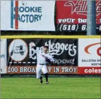  ?? PHOTO BY JOE BOYLE ?? Alex McKenna making a throw from the outfield of Joe L. Bruno Stadium on. McKenna went on to score the game winning, walkoff run that night against the Hudson Valley Renegades.