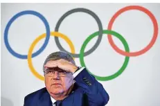  ?? FOTO: COFFRINI/AFP ?? Wo steuert die olympische Idee unter IOC-Präsident Thomas Bach hin? Der oberste Sportfunkt­ionär scheint es selbst nicht zu wissen.