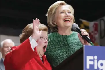  ?? CHIP SOMODEVILL­A/GETTY IMAGES NORTH AMERICA/AFP ?? Maryland Senator Barbara Mikulski (left) and Hillary Clinton hold a campaign rally in Baltimore on April 10.