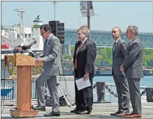  ?? SEAN D. ELLIOT/THE DAY ?? Gov. Dannel P. Malloy, at podium, stands with, from left, State Port Authority Chairman Scott Bates, state Sen. Paul Formica, obscured, state Rep. Chris Soto and New London Mayor Michael Passero to announce a $15 million investment in State Pier on...