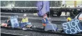  ?? PHOTO: STEPHEN JAQUIERY ?? Protesters delay a coal train near the Dunedin Railway Station.