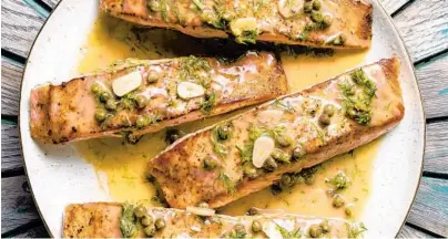  ?? STEVE KLISE/AMERICA’S TEST KITCHEN ?? Piccata, the classic savory sauce, takes salmon in a fresh new direction.