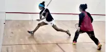  ??  ?? Mihiliya Methsarani serves to Fathu Izzadeen Girls final, on the way to win her fifth straight national title yesterday- Pic by Ranjith Perera