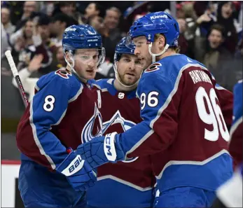  ?? ANDY CROSS — THE DENVER POST ?? Avalanche defenseman Cale Makar ( 8), Devon Toews ( 7), center, and right wing Mikko Rantanen ( 96) celebrate moments after Mikko Rantanen scored against the Edmonton Oilers in the first period at Ball Arena on Thursday.