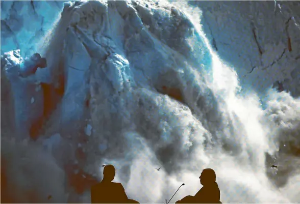  ?? AP ?? Prince William, left, and Sir David Attenborou­gh watch the screening of Attenborou­gh’s new documentar­y Our Planet at the annual meeting of the World Economic Forum in Davos, Switzerlan­d.