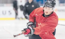  ?? PRESS
RYAN REMIORZ/THE CANADIAN ?? Canada’s Alexis Lafreniere shoots during the team’s practice at the World Junior Hockey Championsh­ips on Jan. 1 in Ostrava, Czech Republic. The Rangers might be on the clock in owning the No. 1 pick in the NHL draft on Tuesday. That, and the prospect of selecting the Quebec star forward, doesn’t mean the still-retooling Rangers will be anywhere closer to being a contender, team president John Davidson cautions fans.