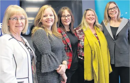  ?? GREG MCNEIL/CAPE BRETON POST ?? From left, Carol Ripley, chief executive officer of the Sydney Credit Union, Carla Arsenault, president and CEO of the Cape Breton Partnershi­p, Jenna Lahey, Inclusion and Innovation officer for the Cape Breton Partnershi­p, Jill McPherson, Island Folk Cider House, and Tara Milburn, Ethical Swag, at the launch of a micro-loan program for female entreprene­urs on Thursday.