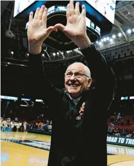  ?? BRYNN ANDERSON/AP ?? Hurricanes coach Jim Larrañaga cheers with fans after a win over Auburn in the second round of the NCAA tournament on March 20 in Greenville, S.C.