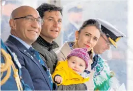  ?? Photo / Getty Images ?? Clarke Gayford helps take care of daughter Neve while Jacinda Ardern executes her high-powered job.