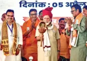  ?? ?? Prime Minister Narendra Modi being presented a memento during a public meeting ahead of Lok Sabha elections in Churu, Rajasthan, on Friday