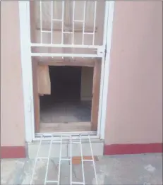  ?? Photo: Steven Klukowski ?? Forceful entry… The backdoor through which the group gained access to the Swapo office in Keetmansho­op.