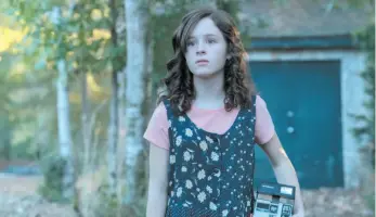  ?? PHOTO BY TINA ROWDEN NETFLIX ?? Lulu Wilson appears in a scene from The Haunting of Hill House.