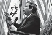  ?? JOE CAVARETTA/SUN SENTINEL FILE ?? Gov. Ron DeSantis speaks about his upcoming trip to Israel at Temple Kol Ami Emanu-El, a Plantation synagogue.