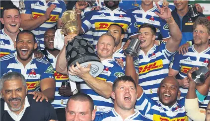  ?? Picture: Gallo Images ?? BUBBLING OVER. Western Province players celebratin­g after winning the Currie Cup when they beat the Sharks in the final at King’s Park on Saturday.