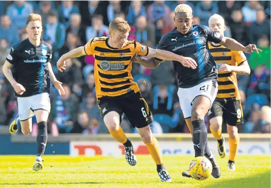  ?? SNS. ?? Rovers’ Willis Furtado challenges Alloa’s Jon Robertson during Saturday’s clash. The two sides meet again tonight at the Indodrill.