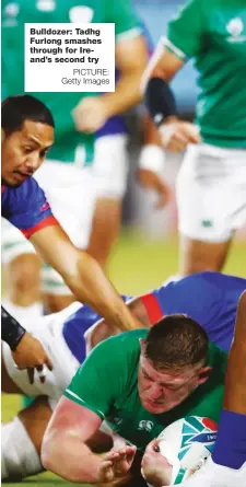  ?? PICTURE: Getty Images ?? Bulldozer: Tadhg Furlong smashes through for Ireand’s second try