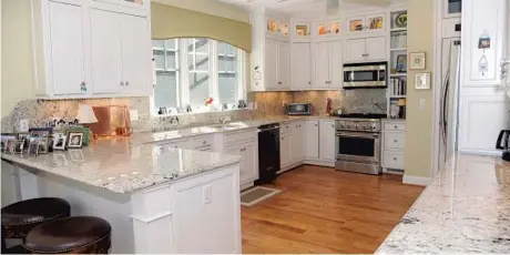  ?? PAUL W. GILLESPIE/BALTIMORE SUN MEDIA GROUP PHOTOS ?? The kitchen in the Eastport home of Rolf and Muffie Schou.