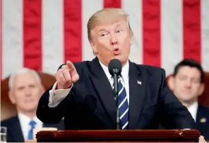  ??  ?? Donald Trump addresses a joint session of Congress on Capitol Hill in Washington. — AP