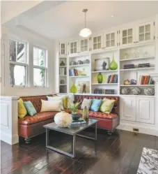  ??  ?? Above: 2830 Buchanan St. is a shingled Edwardian in Pacific Heights available for $6.5 million. Below: A family area rests off the kitchen.