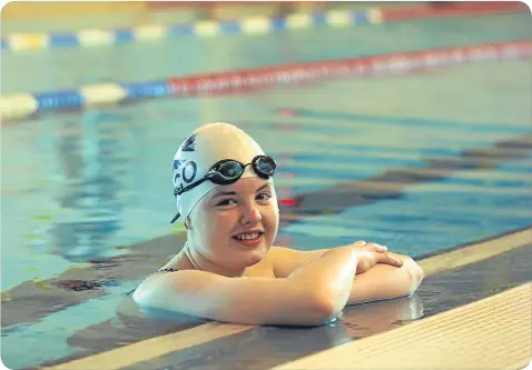  ??  ?? n
The champion swimmer turned to crowdfundi­ng to pay for her amputation. Below, with First Minister Nicola Sturgeon.