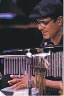  ??  ?? Percussion­ist John Santos plays with Electric Squeezebox Orchestra at the new Rendon Hall.