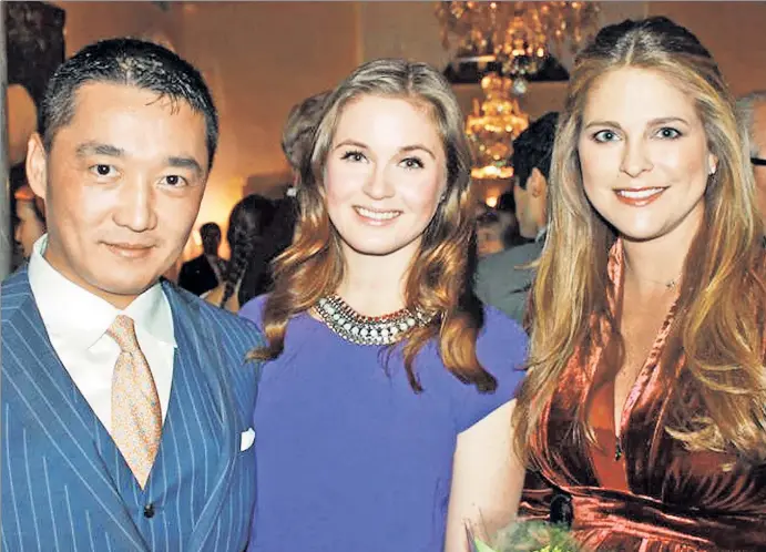  ??  ?? SWANKY: Wall Streeter Benjamin Wey, at a 2013 gala with accuser Hanna Bouveng (center) and Sweden’s Princess Madeleine, in a photo shown at his trial Monday.