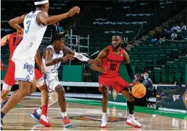  ?? CONTRIBUTE­D BY THE NIT ?? University of Dayton guard Jalen Crutcher ended his Flyers career in a matchup against his hometown team, Memphis, in a first-round NIT game Saturday in Denton, Texas. Crutcher had six points on 3-of-10 shooting in a Flyers loss.