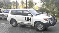  ??  ?? ‘Obstaculiz­an’. La comitiva de la OPAQ, con el apoyo de la ONU, busca pruebas de ataque químico contra civiles.