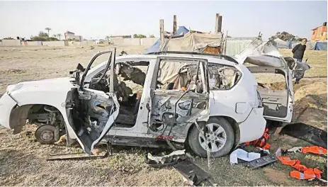  ?? ?? Heavily damaged vehicle of the World Central Kitchen (WCK) is seen after an Israeli attack in Deir al-balah of Gaza on Tuesday