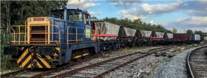  ?? OWEN EDWARDS ?? A remarkable sight for a heritage railway as Hunslet 9000, newly arrived from Sellafield nuclear site, heads a lengthy rake of ‘MGR’ (merrygo-round) coal hoppers at the Chasewater Railway’s coal train day on October 16. While there were literally thousands of these wagons on BR just a few years ago, only a very few exist today. The MGR collection is a joint venture between Chasewater and the National Wagon Preservati­on Group who between them, have managed to acquire and restore nine of these iconic vehicles.