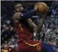  ?? CHARLES KRUPA — THE ASSOCIATED PRESS ?? LeBron James recoils after colliding with Celtics forward Jayson Tatum during the first half May 15 in Boston.