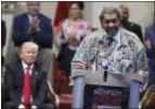  ?? EVAN VUCCI — THE ASSOCIATED PRESS ?? Republican presidenti­al candidate Donald Trump listens as he is introduced by boxing promoter Don King prior to speaking to the Pastors Leadership Conference at New Spirit Revival Center, Wednesday in Cleveland, Ohio.