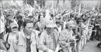  ??  ?? Protesters in Quito yesterday (Reuters photo)