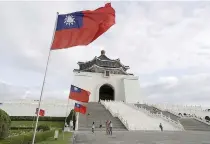  ?? AP FILE PHOTO ?? FLAGS FLUTTERING
Taiwanese flags are fluttering in the wind at the Chiang Kai-shek Memorial Hall in Taiwan’s capital Taipei on Oct. 30, 2023.