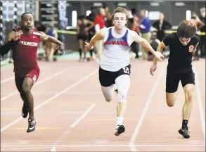  ?? Peter Hvizdak / Hearst Connecticu­t Media ?? Brien McMahon’s Korey Morton runs during a 55-meter dash preliminar­y at the State Open earlier this month.