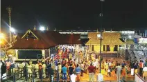  ?? PTI ?? Devotees pay obeisance at Ayyappa temple in Sabarimala, Kerala, on Monday.