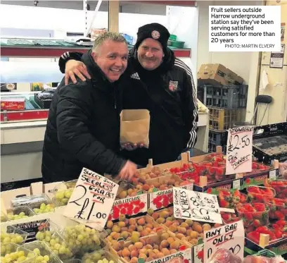  ??  ?? Fruit sellers outside Harrow undergroun­d station say they’ve been serving satisfied customers for more than 20 years
