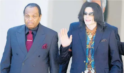  ?? Photo / AP ?? Joe Jackson ( left) supported son Michael during the king of pop’s child-molestatio­n trial in Santa Barbara.