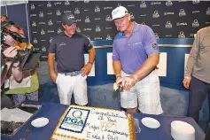  ??  ?? Phil Mickelson of the United States and Ernie Els of South Africa celebrate their 100th major championsh­ip during a press conference prior to the 2017 PGA Championsh­ip at Quail Hollow Club on August 8, 2017 in Charlotte, North Carolina. - AFP photo