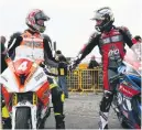  ??  ?? Kneen and Dunlop show mutual respect after some great racing