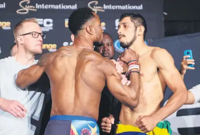  ?? Picture: Gallo Images ?? NO LOVE LOST. Things got heated during yesterday’s weigh-in ahead of Gunther Kalunda (left) and Jose da Rocha’s title fight at EFC73 at Sun City tonight.