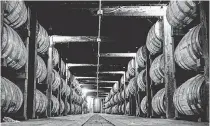  ??  ?? Barrels of whiskey are being aged in one of the barrel warehouses at the Jack Daniel Distillery in Lynchburg, Tenn. This barrel warehouse holds more than 1 million gallons of whiskey. ANDREW NELLES/THE TENNESSEAN