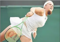  ??  ?? Latvia’s Jelena Ostapenko in action during her third round match against Italy’s Camila Giorgi. — Reuters photo