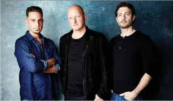  ?? TAYLOR JEWELL/THE ASSOCIATED PRESS ?? Alleged victim Wade Robson, left, director Dan Reed and alleged victim James Safechuck promoted the film Leaving Neverland at the recent Sundance Film Festival.