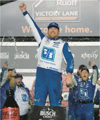  ?? PHELAN M. EBENHACK/AP ?? Chris Buescher celebrates after winning Saturday’s NASCAR Cup regular-season finale at Daytona.