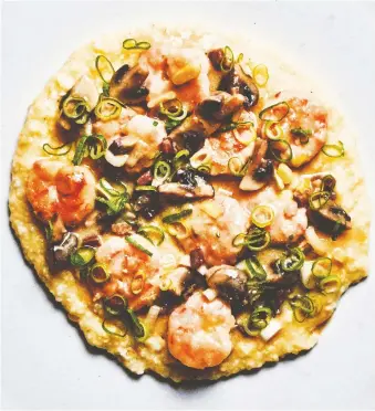  ?? PHOTOS: PETER FRANK EDWARDS ?? Author Sean Brock’s shrimp and grits are traditiona­l to the American south.