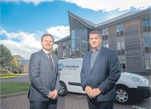  ??  ?? GROWTH PLANS: Gavin McCombie and Trevor Mutch of decorators R Davidson