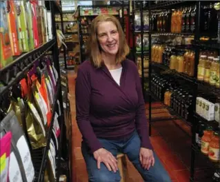  ?? BRENT DAVIS, RECORD STAFF ?? Eileen Grogan will be closing her store, Eating Well Organicall­y, after 20 years in uptown Waterloo.
